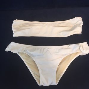 Cream ruffle bottom bikini by Cusp